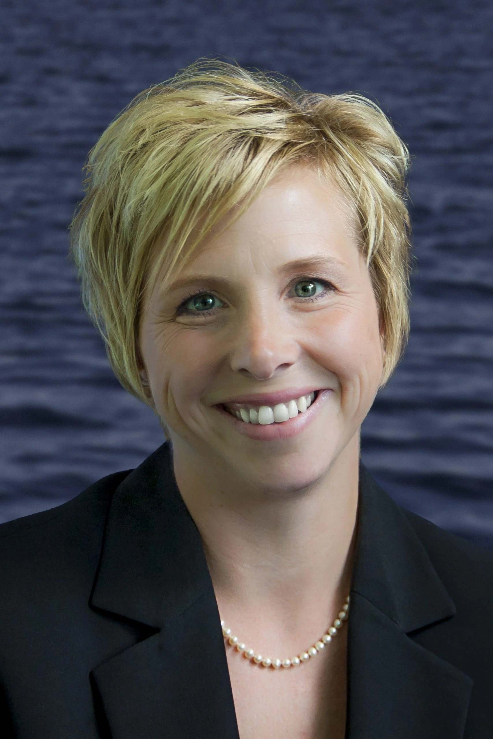 Kristi-Kelly-Headshot-scaled